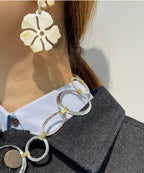 【ROOM.THE.ROOM】Buffalo horn flower earrings