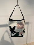 Jacquard floral bucket bag